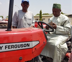 Niger State Commissioner inspecting tractors